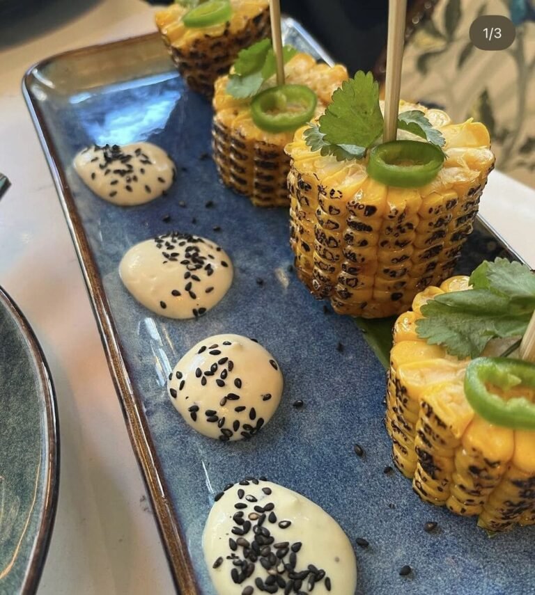 Bao buns and shiso butter corn served as small plates at Titu