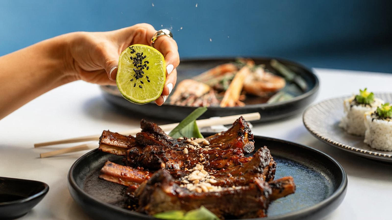 Lime squeezed over grilled lamb ribs, Titu Mayfair London - Food Menu