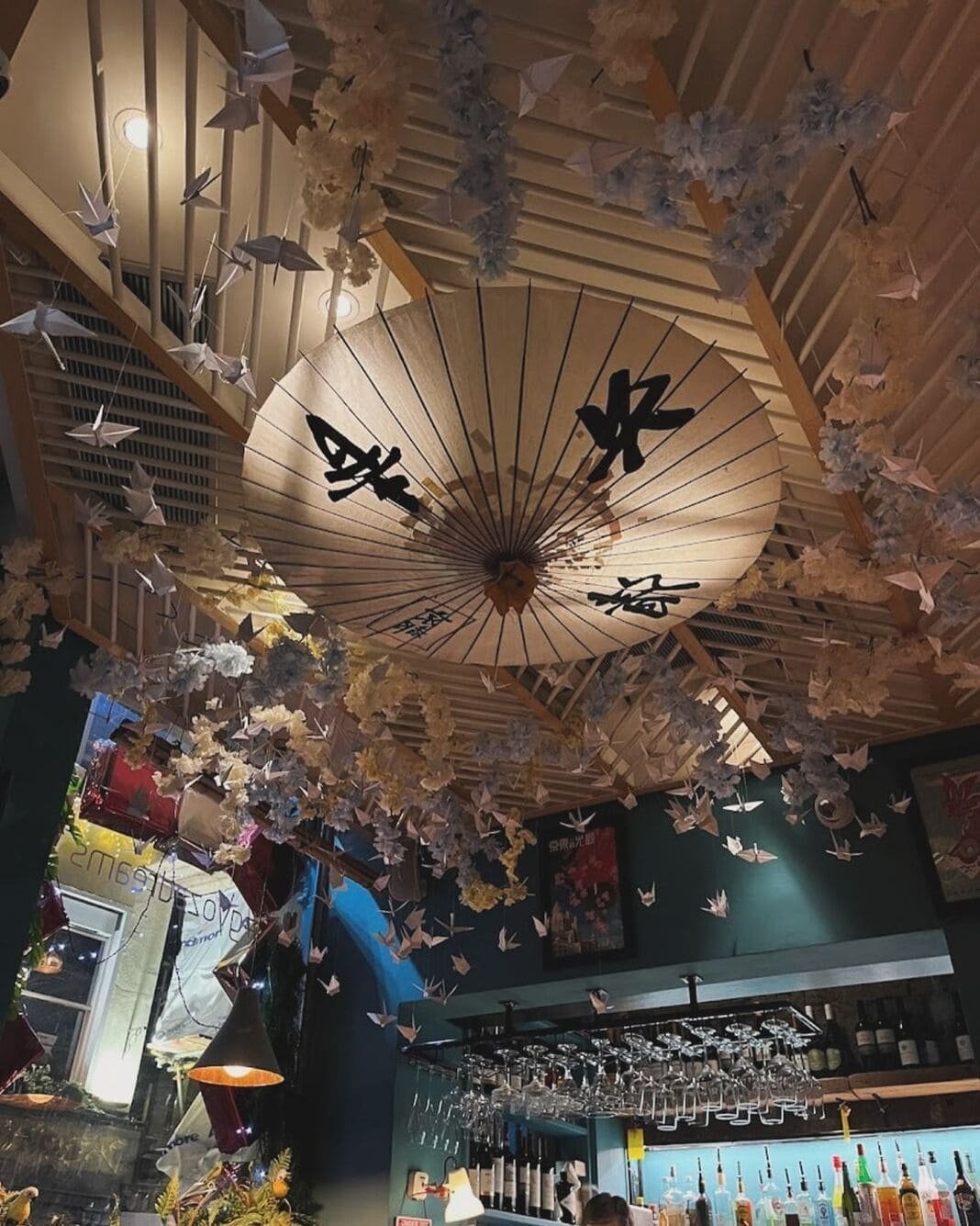Paper parasol and origami ceiling above Titu Mayfair bar, London